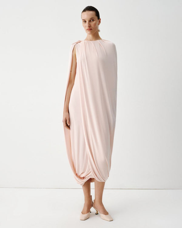 Pink jersey dress with a cape