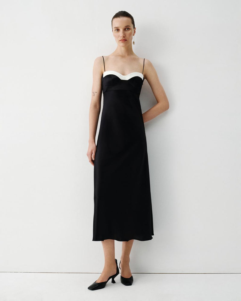 Black silk bustie dress with white details