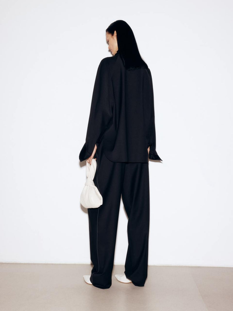 Oversize black wool trousers