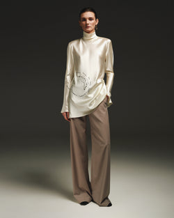 Cream silk blouse with  black embroidery